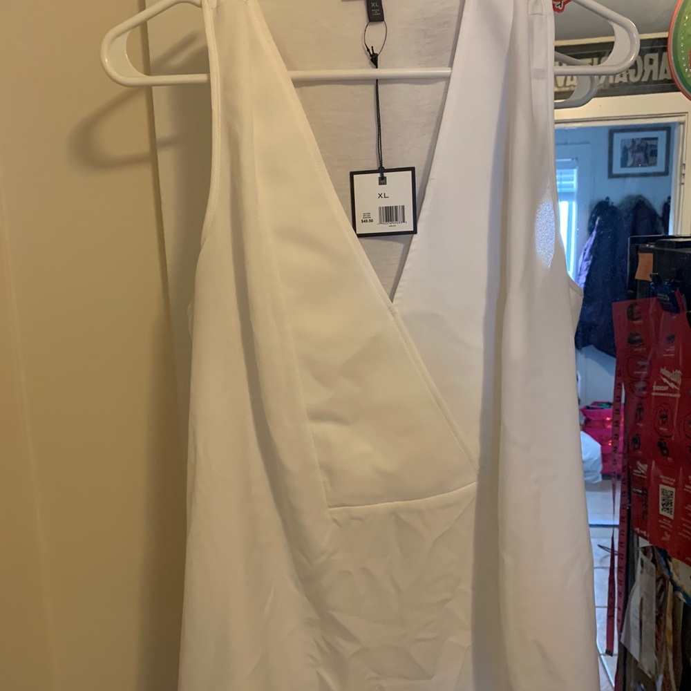 Brand new beautiful white sleeveless blouse